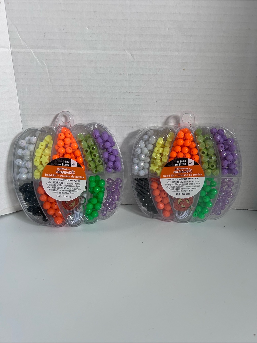 Set of 2 Creatology Halloween bead kit in clear pumpkin shape container